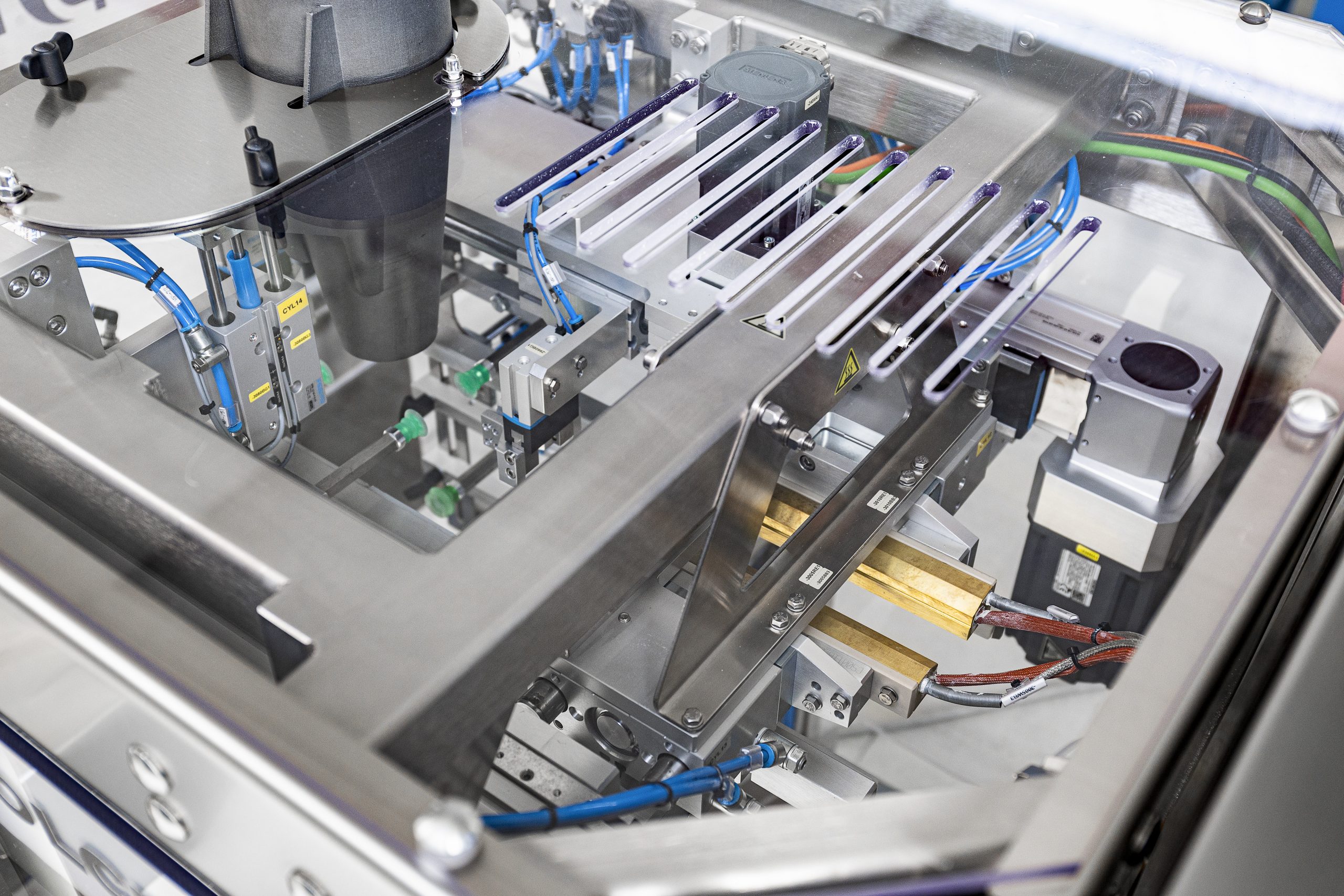 Close-up of packaging machinery components used to evaluate production requirements