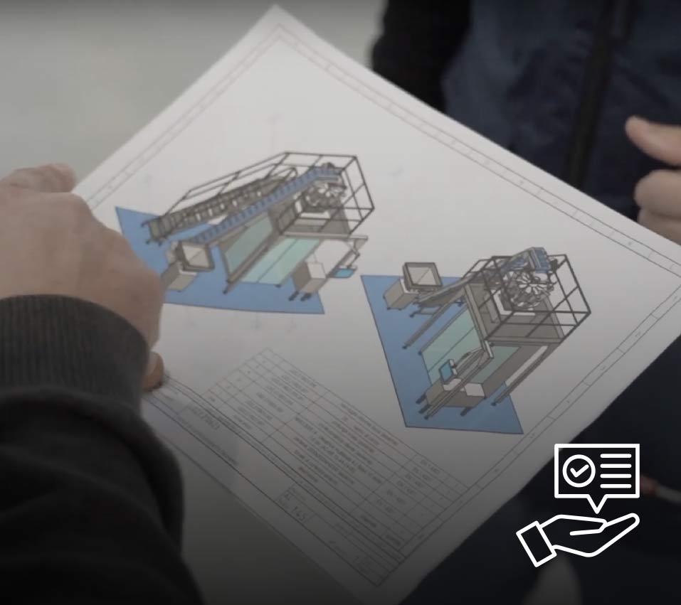 Packaging machinery layout drawing reviewed during an advisory planning discussion